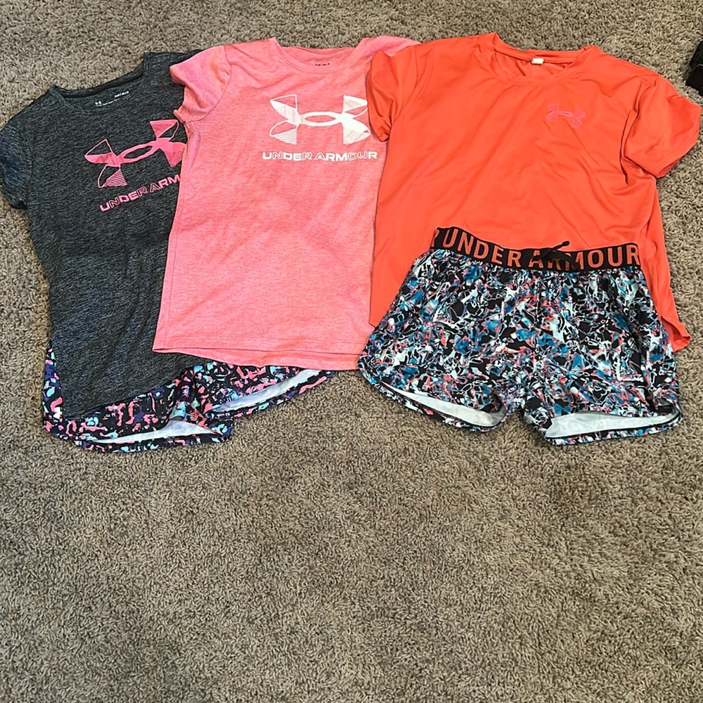 I’m selling two sets with an extra shirt all under armor and also all YGL
